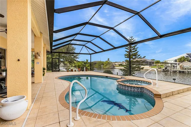 a view of a swimming pool with a patio