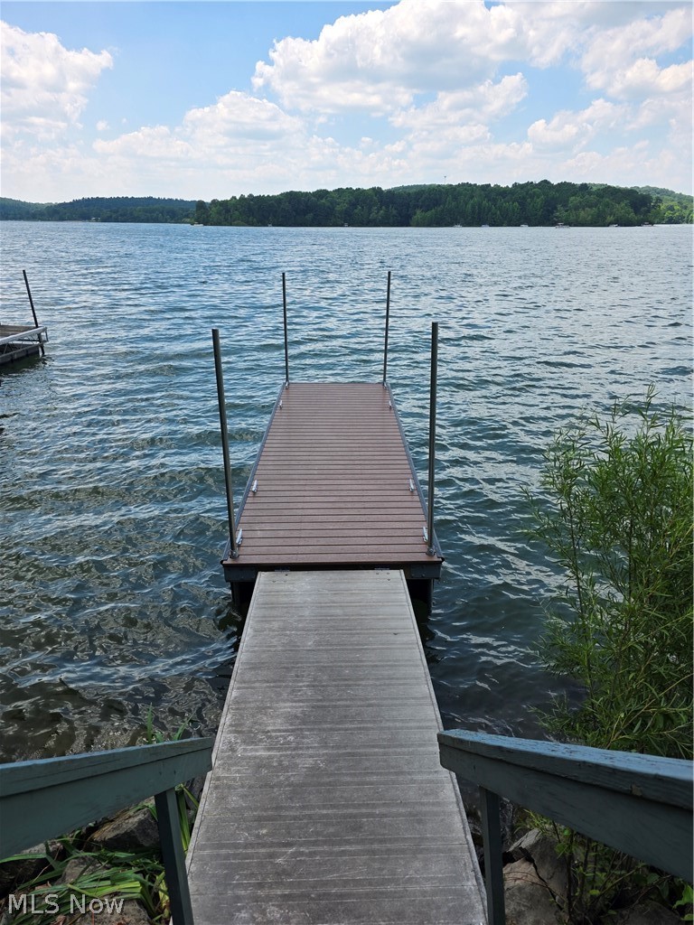 2873 Lodge Road Southwest Sherrodsville, OH 44675 - Photo 8 of 49 View from new dock. Great dock for your nautical toys to explore the lake.