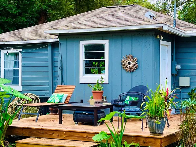 a view of house with outdoor seating space