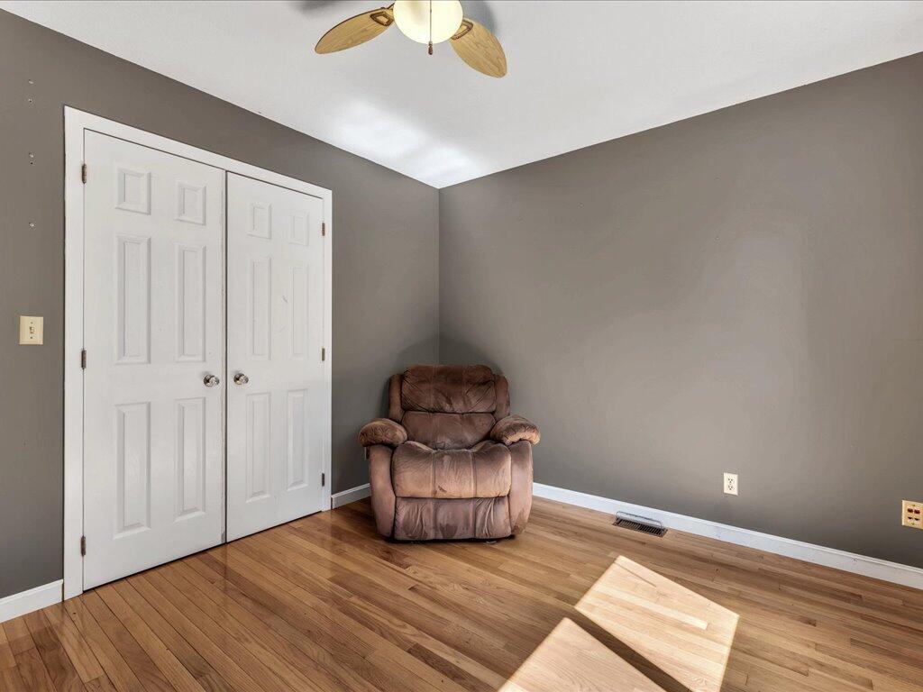 62 Deer Ridge Road Mashpee, MA 02649 - Photo 23 of 40 a room with hard wood floors and a window