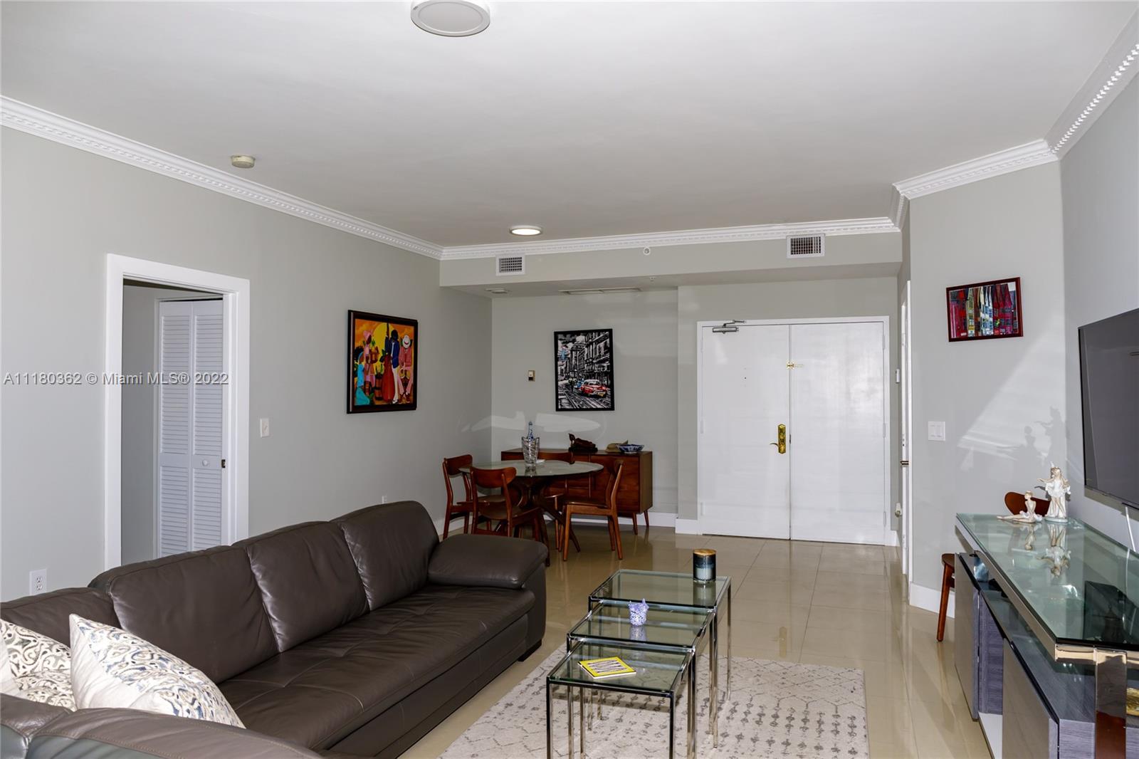 6301 Collins Avenue, Unit PH4 Miami Beach, FL 33141 - Photo 4 of 18 a living room with furniture