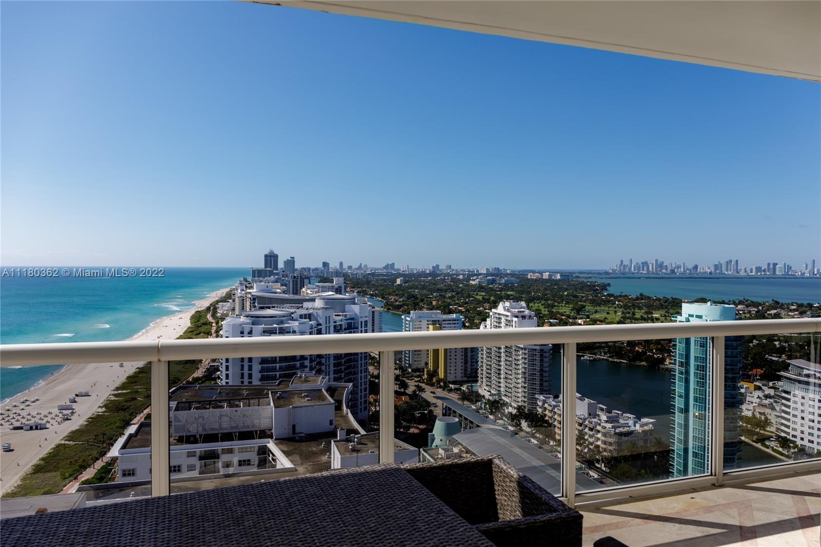 6301 Collins Avenue, Unit PH4 Miami Beach, FL 33141 - Photo 6 of 18 a view of a balcony with an ocean view