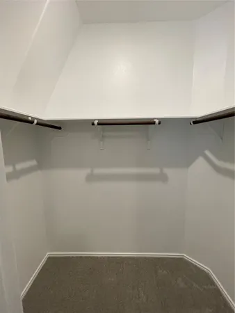 a bathroom with a tub and a shower