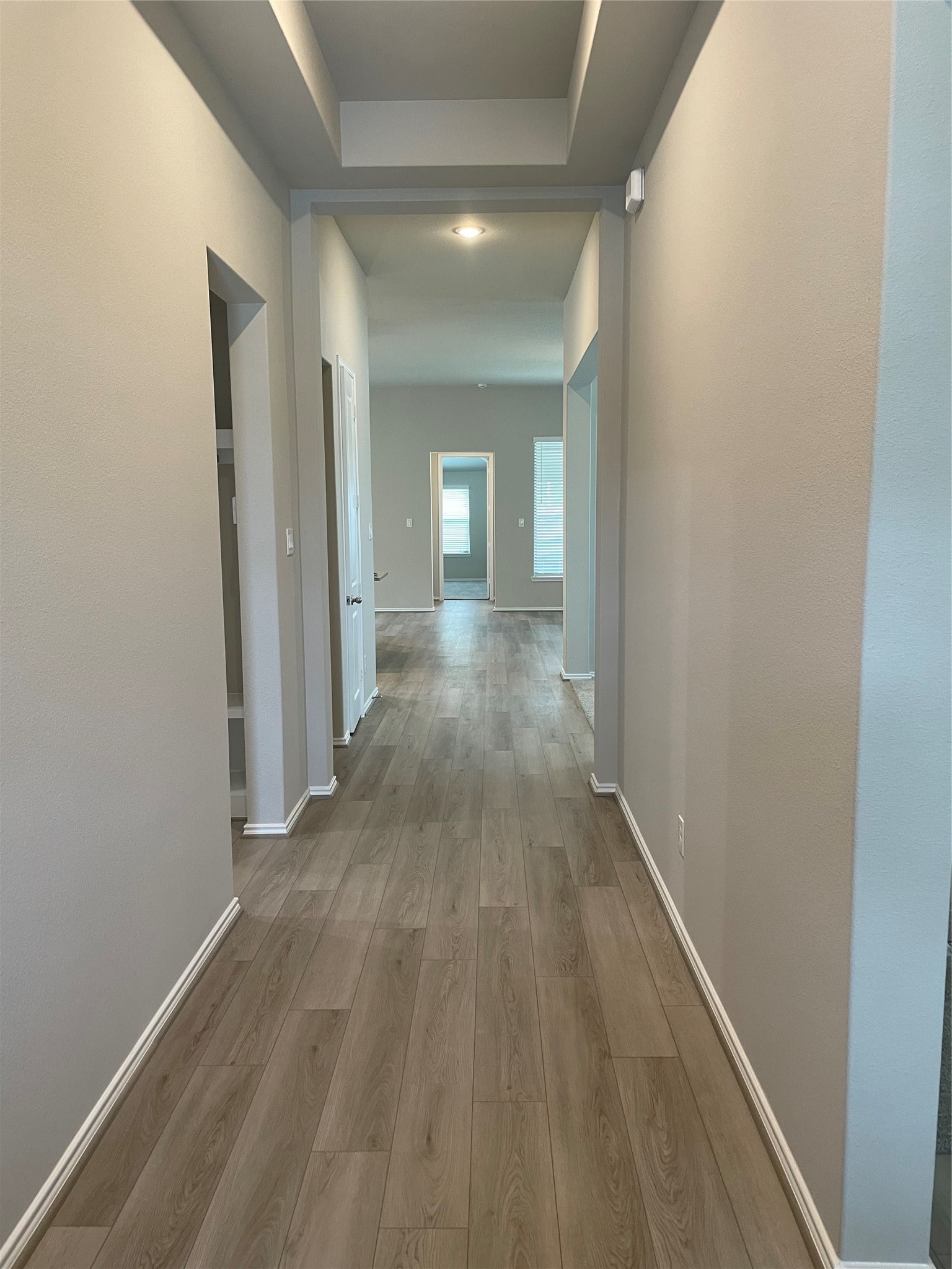 2302 Hazel Berry Street Manvel, TX 77578 - Photo 5 of 27 a view of a hallway with wooden floor