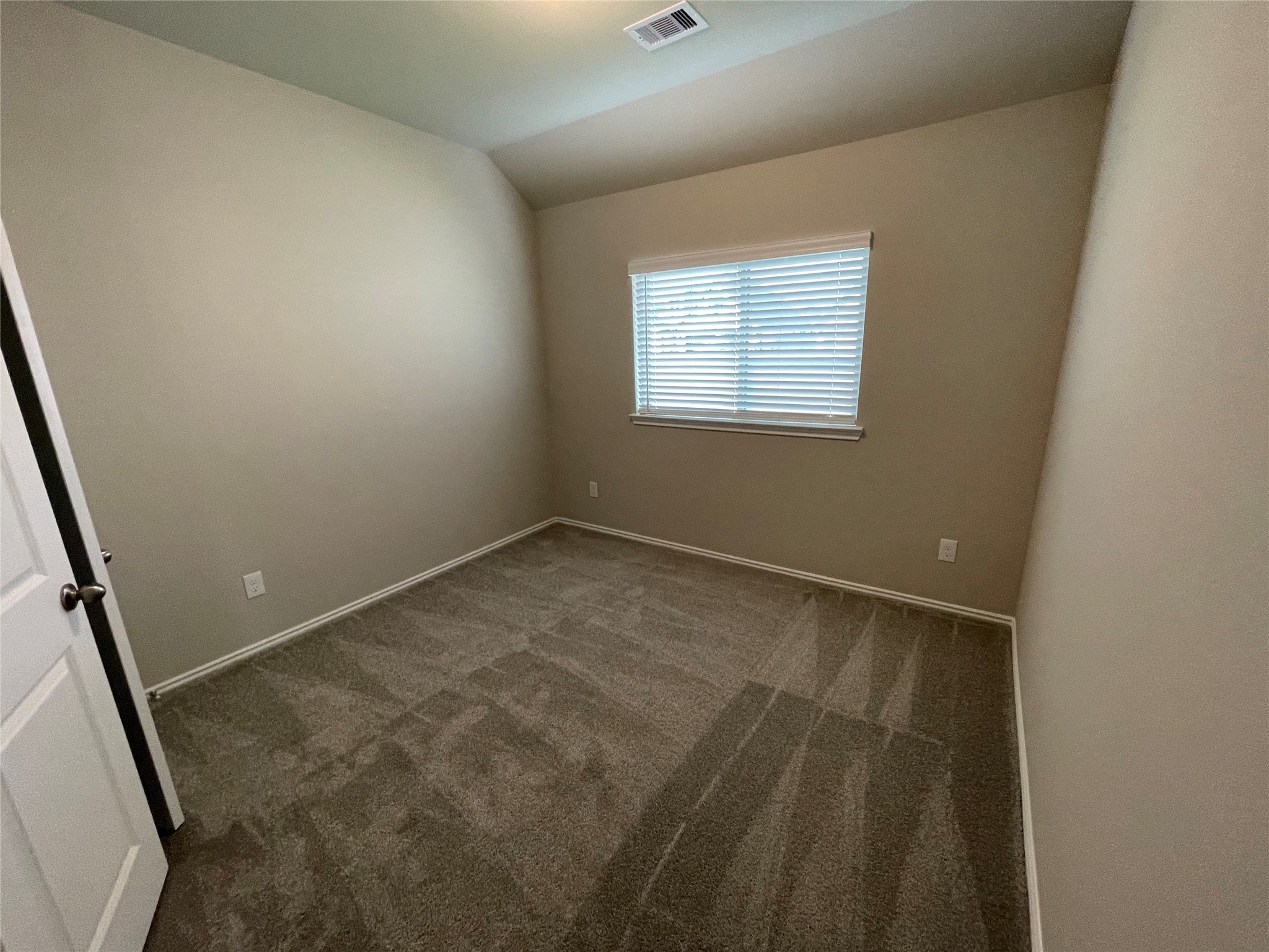 2302 Hazel Berry Street Manvel, TX 77578 - Photo 8 of 27 an empty room with a window