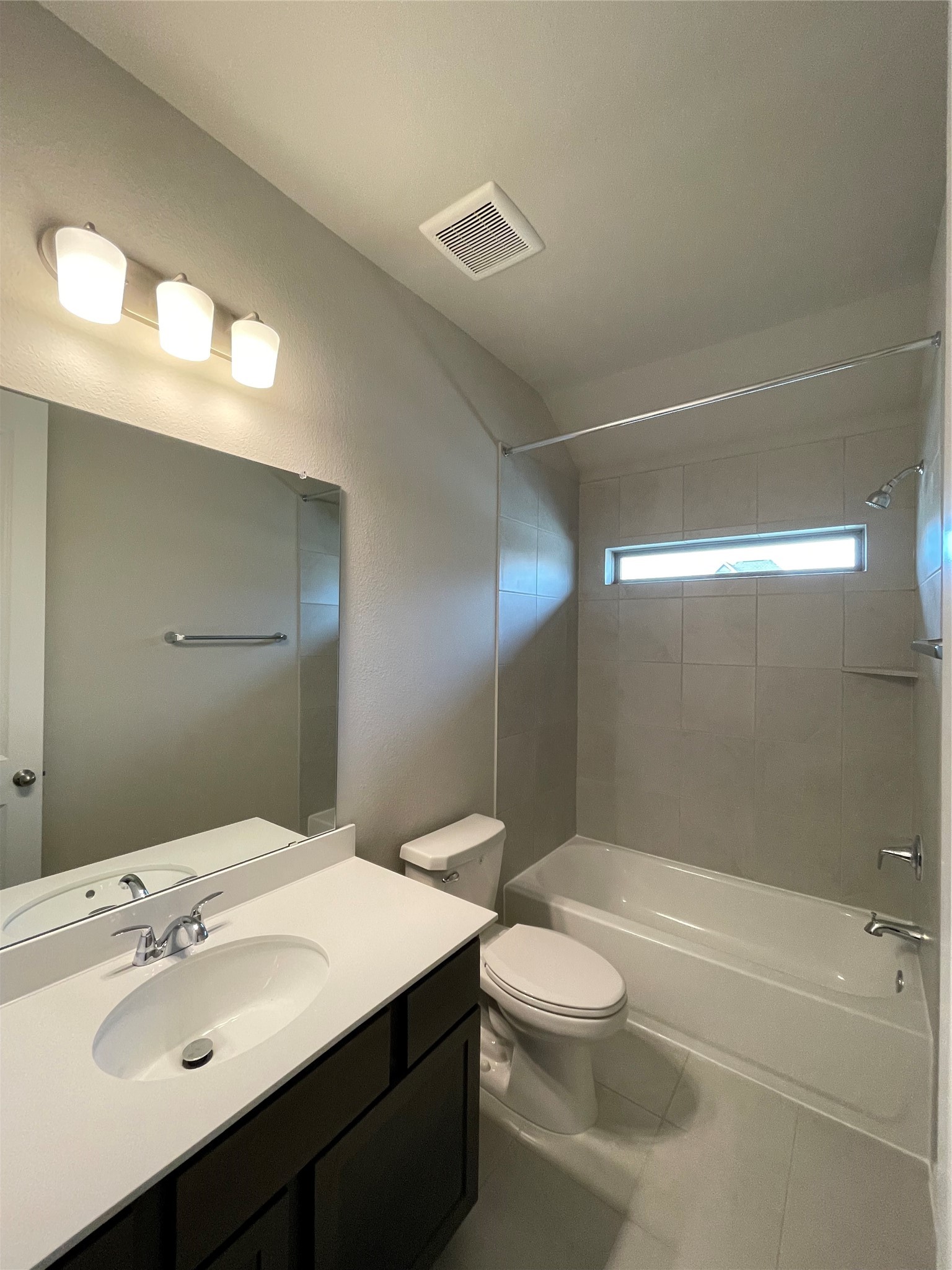2302 Hazel Berry Street Manvel, TX 77578 - Photo 9 of 27 a bathroom with a sink a toilet and shower