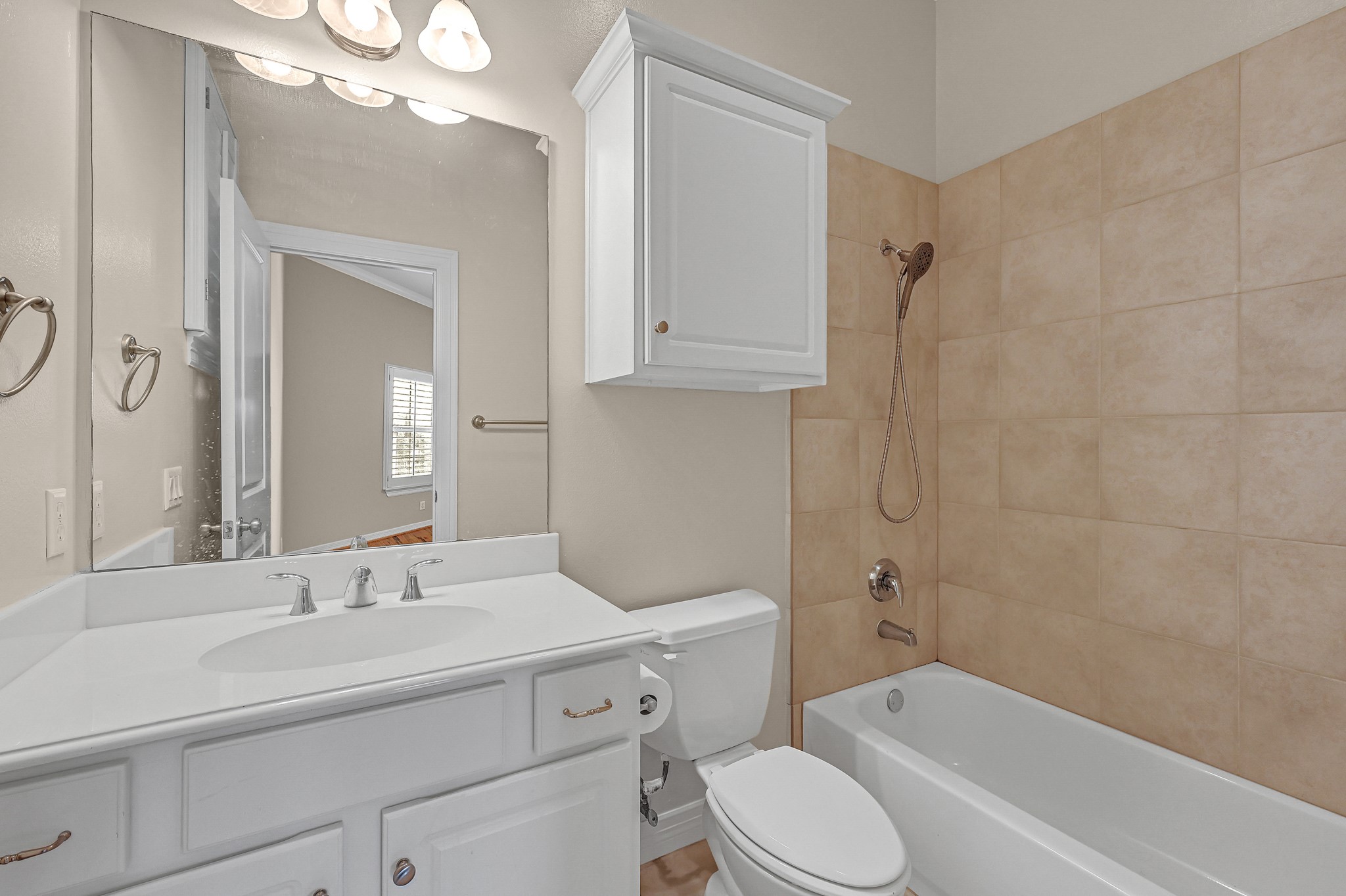 1204 Cohn Street Houston, TX 77007 - Photo 25 of 25 a bathroom with a sink a toilet and bathtub