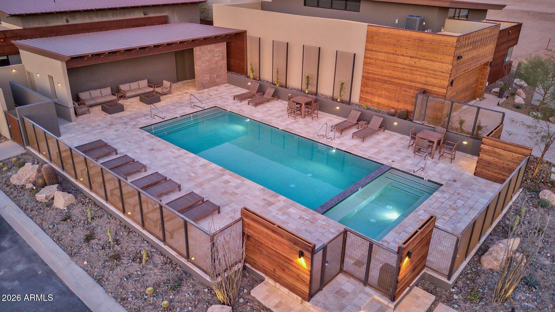 6525 East Cave Creek Road, Unit 105 Cave Creek, AZ 85331 - Photo 14 of 14 a backyard of a house with barbeque oven