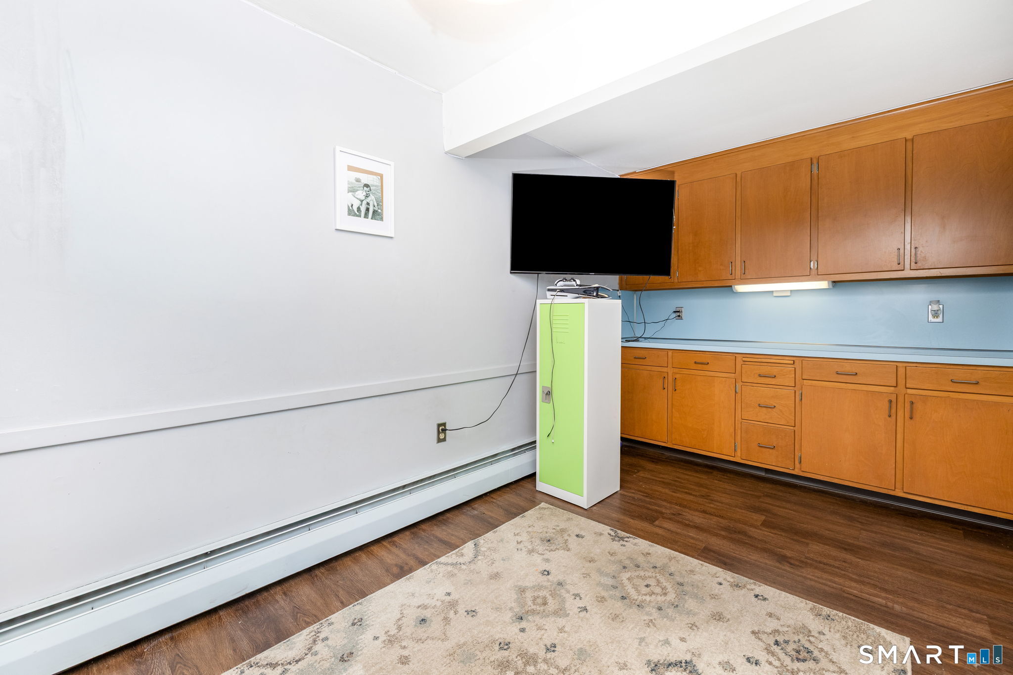 325 Barbara Road Middletown, CT 06457 - Photo 33 of 40 a view of a livingroom with wooden floor