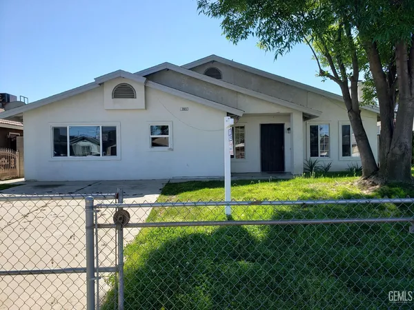 a house view with a garden space