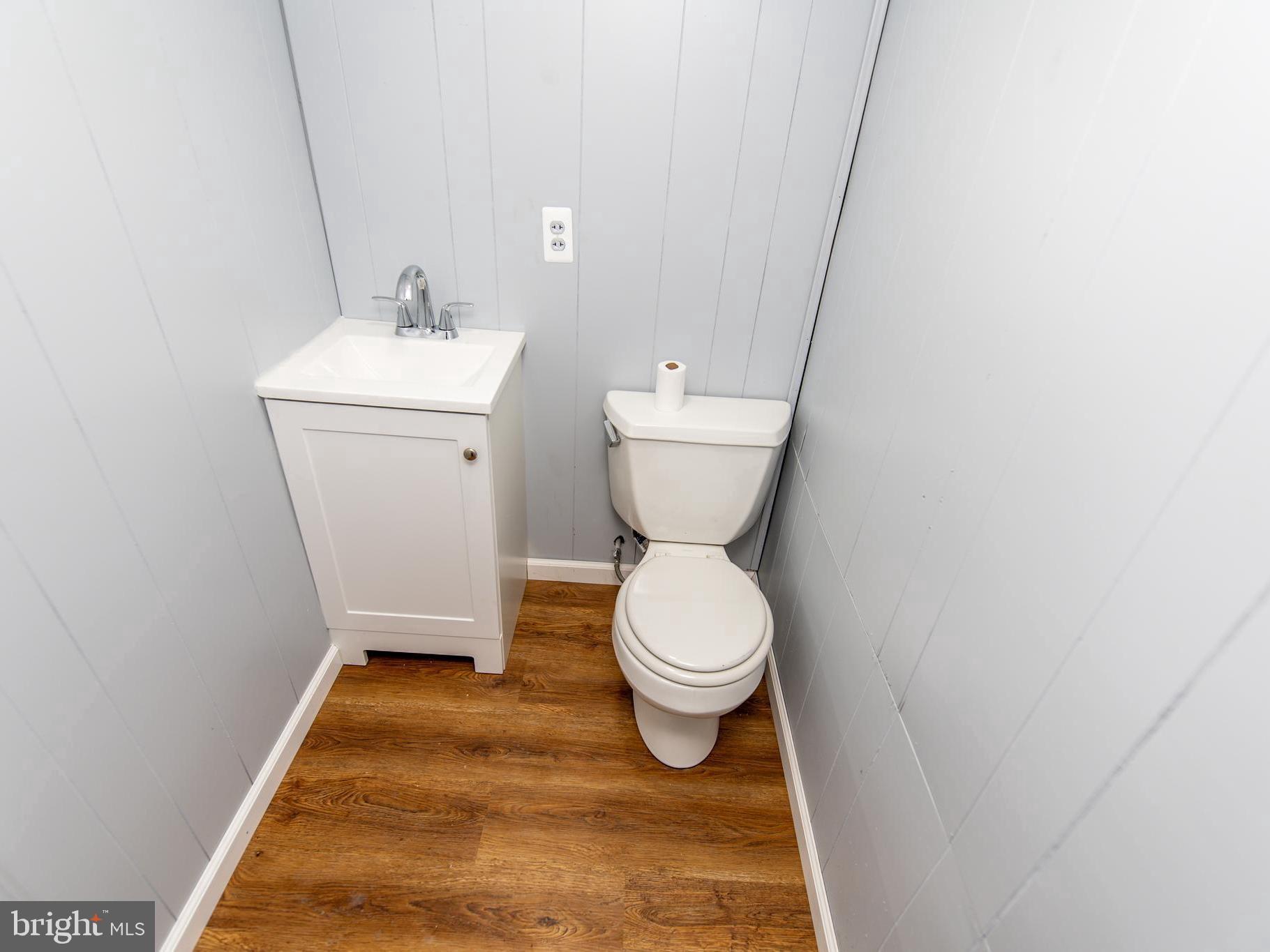 2605 Ambler Road Baltimore, MD 21222 - Photo 20 of 25 a bathroom with a toilet and a sink