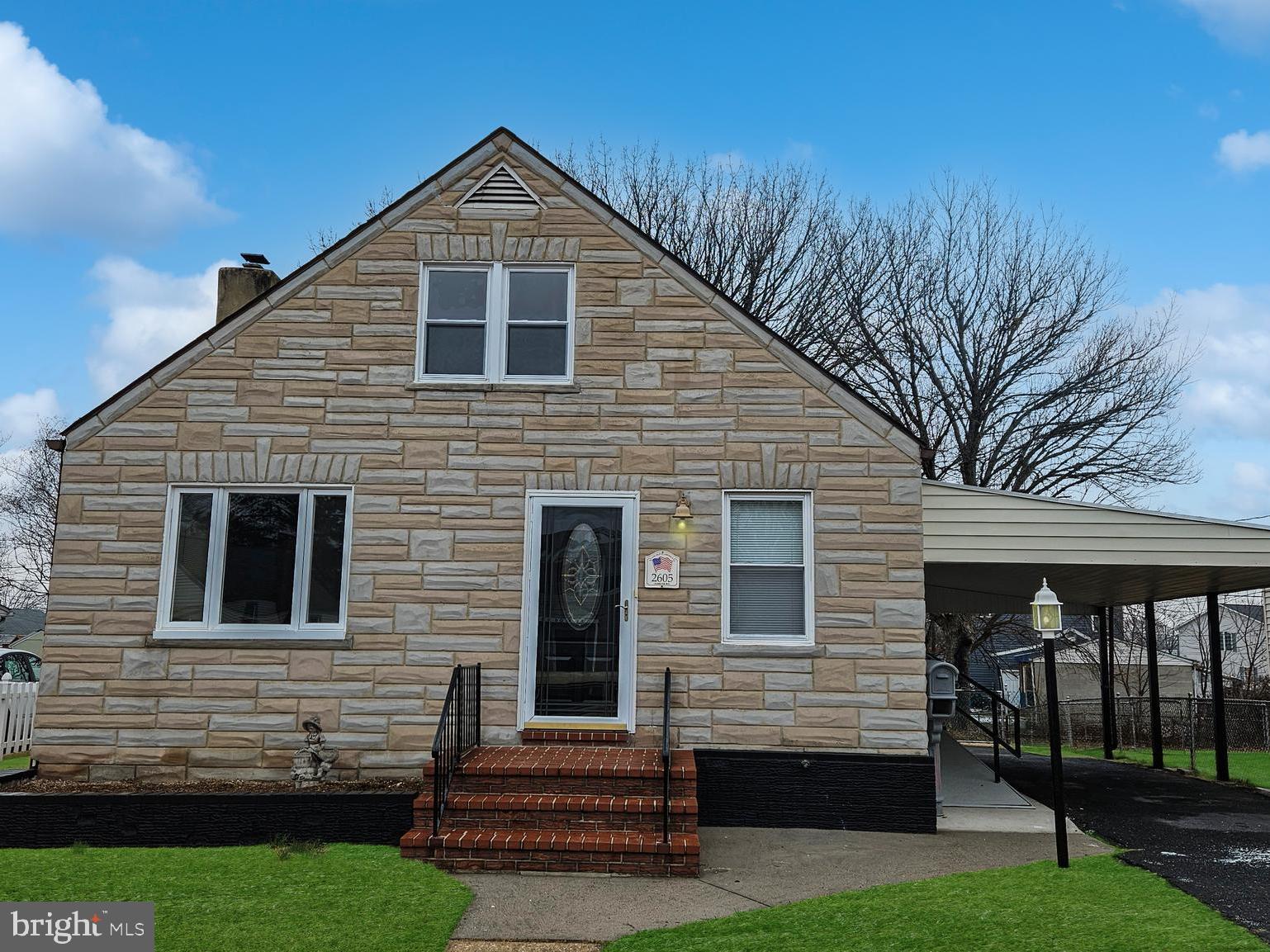2605 Ambler Road Baltimore, MD 21222 - Photo 2 of 25 a front view of a house with a yard