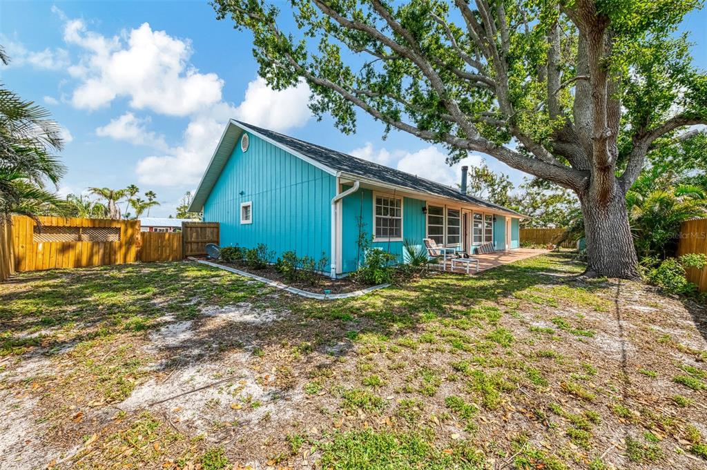 1137 Ponderosa Road Venice, FL 34293 - Photo 37 of 48 a view of a house with a yard