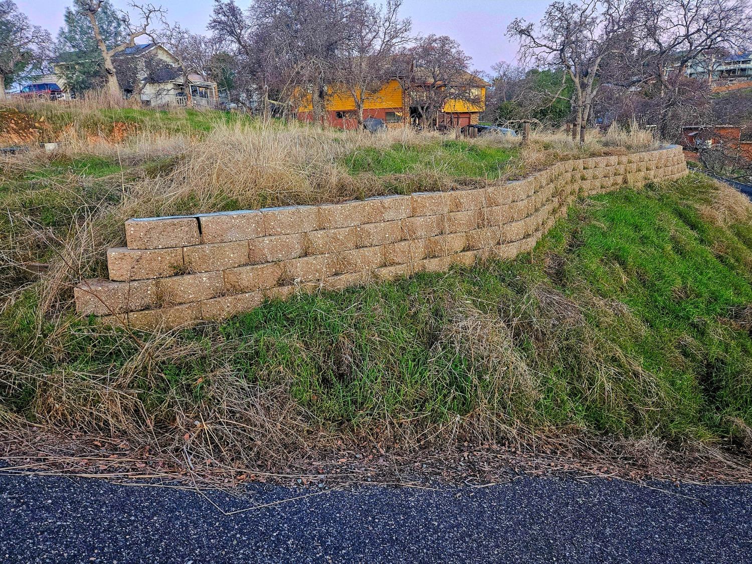 3980 Arrowhead Street Copperopolis, CA 95228 - Photo 6 of 19 retaining wall when house and deck were there.