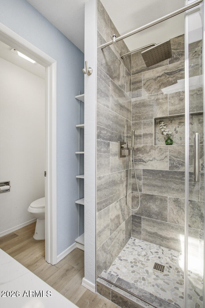 165 Verde Valley School Road, Unit 6 Sedona, AZ 86351 - Photo 28 of 40 a bathroom with a shower and a toilet