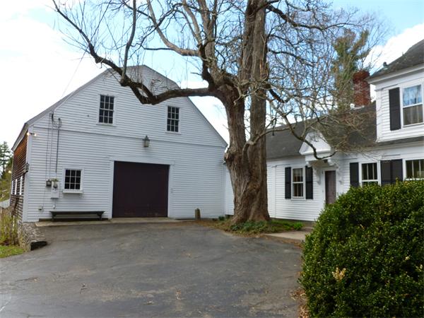 212 South Road Pepperell, MA 01463 - Photo 3 of 22 a house that has a tree in front of it