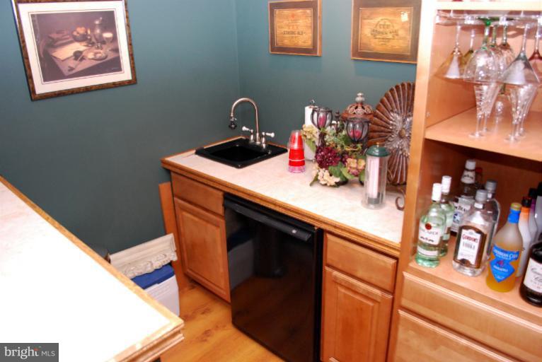 607 Havenhill Road Edgewater, MD 21037 - Photo 13 of 29 a hallway with table and chairs