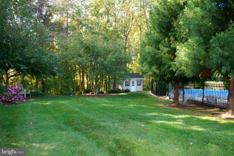 607 Havenhill Road Edgewater, MD 21037 - Photo 22 of 29 a view of a house with a backyard