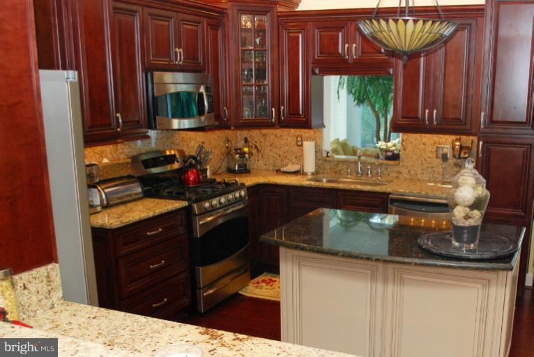 607 Havenhill Road Edgewater, MD 21037 - Photo 23 of 29 a kitchen with a sink and cabinets