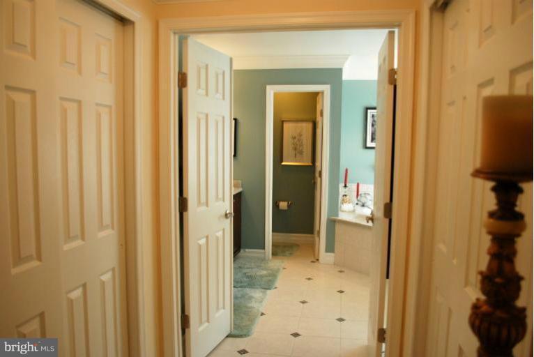 607 Havenhill Road Edgewater, MD 21037 - Photo 26 of 29 a view of a bathroom with a shower and a sink