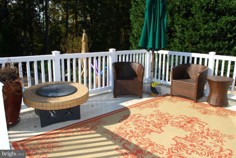 607 Havenhill Road Edgewater, MD 21037 - Photo 27 of 29 a view of a chair and table of the backyard