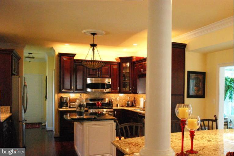 607 Havenhill Road Edgewater, MD 21037 - Photo 9 of 29 a kitchen with a sink cabinets and wooden floor