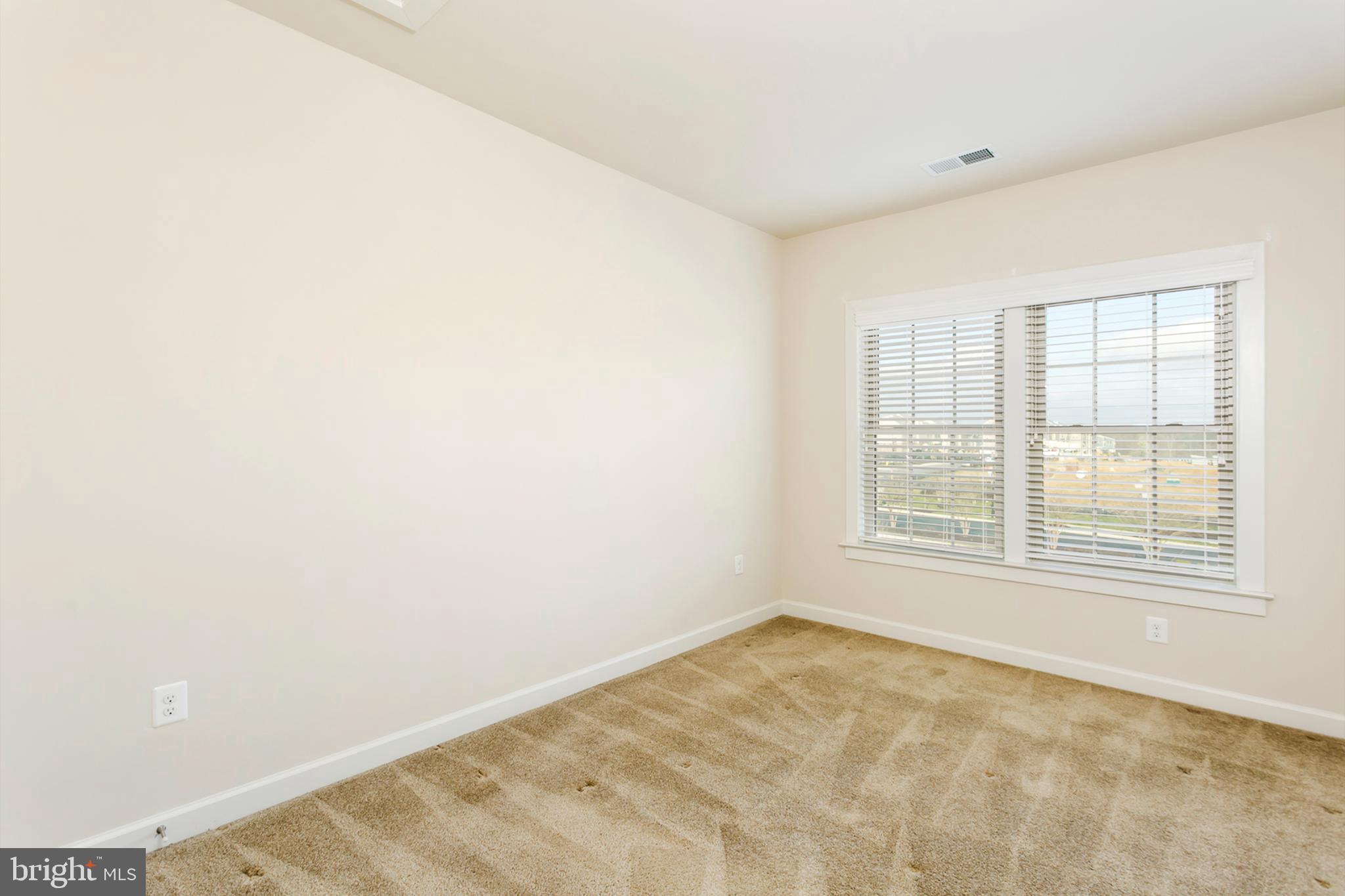 7812 Patterson Way Hanover, MD 21076 - Photo 11 of 15 an empty room with a window