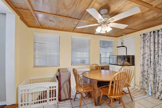 a bathroom with a sink vanity and a mirror