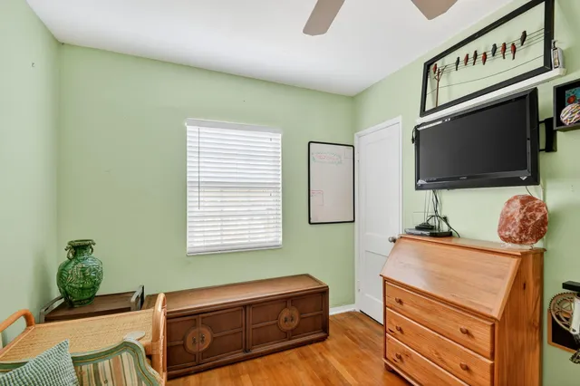 a view of a backyard with chairs