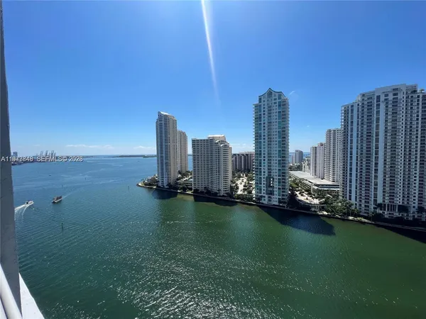 a view of a city with tall buildings