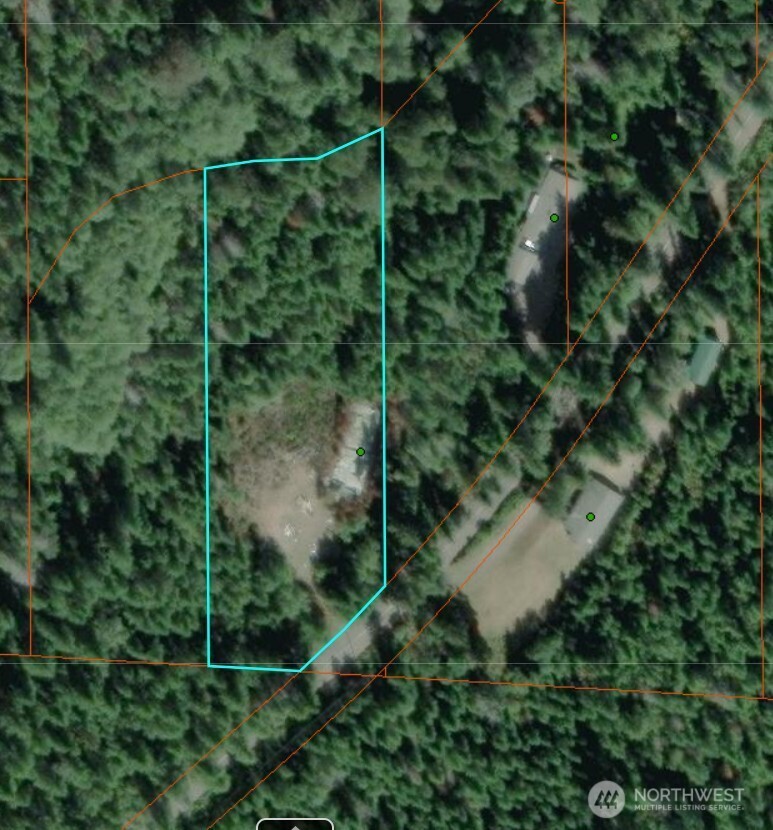 3791 Northeast Sand Hill Road Belfair, WA 98528 - Photo 13 of 13 a view of a backyard