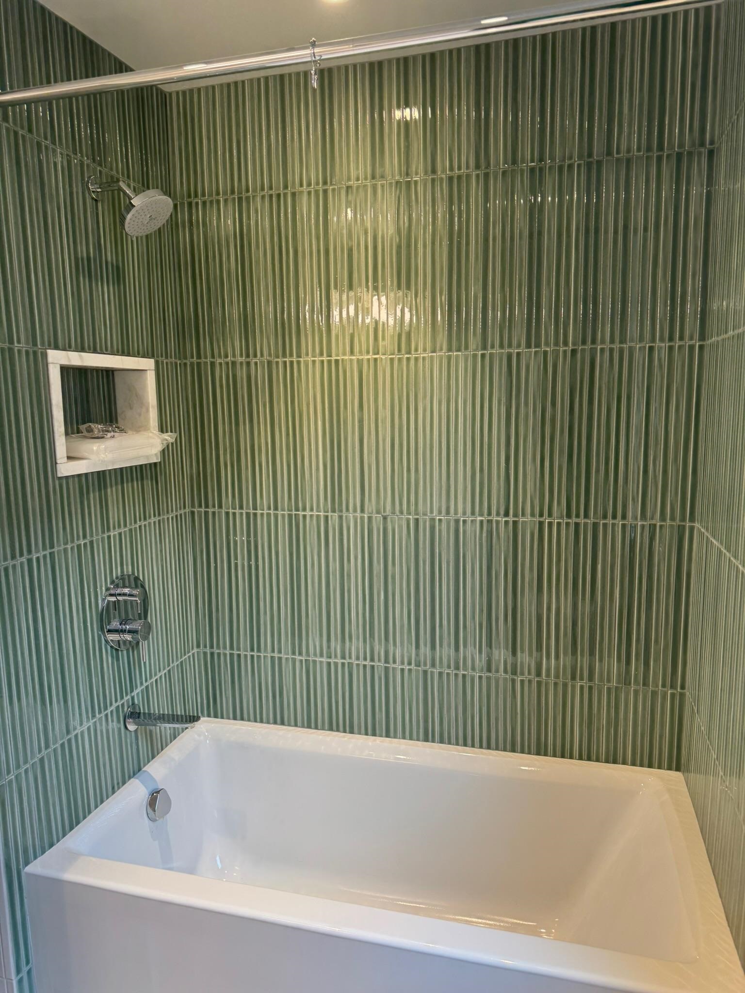 625 Court Street Hoboken, NJ 07030 - Photo 8 of 14 a bathroom with a bathtub