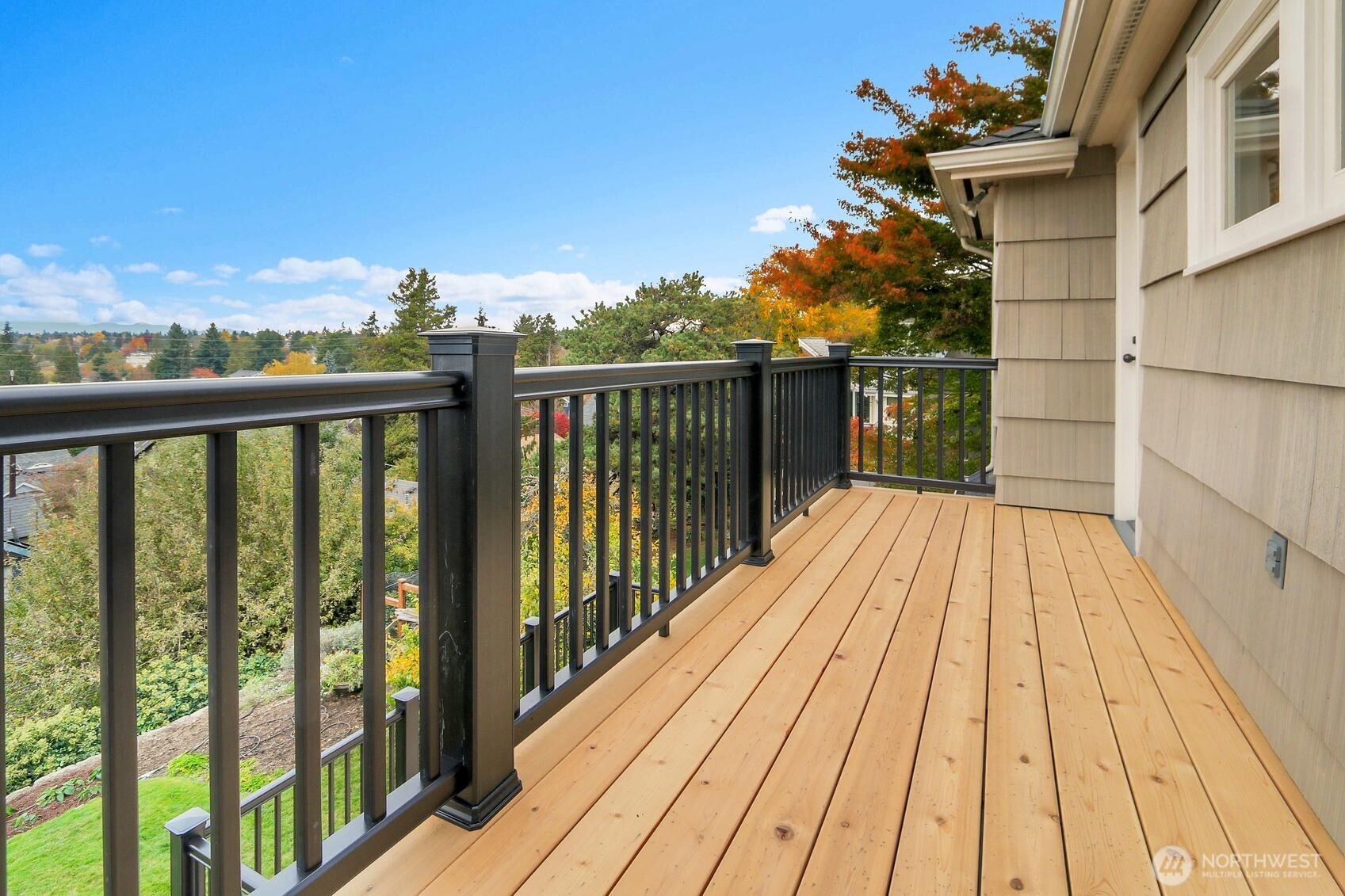6535 Sycamore Avenue Northwest Seattle, WA 98117 - Photo 19 of 23 a view of balcony with wooden floor
