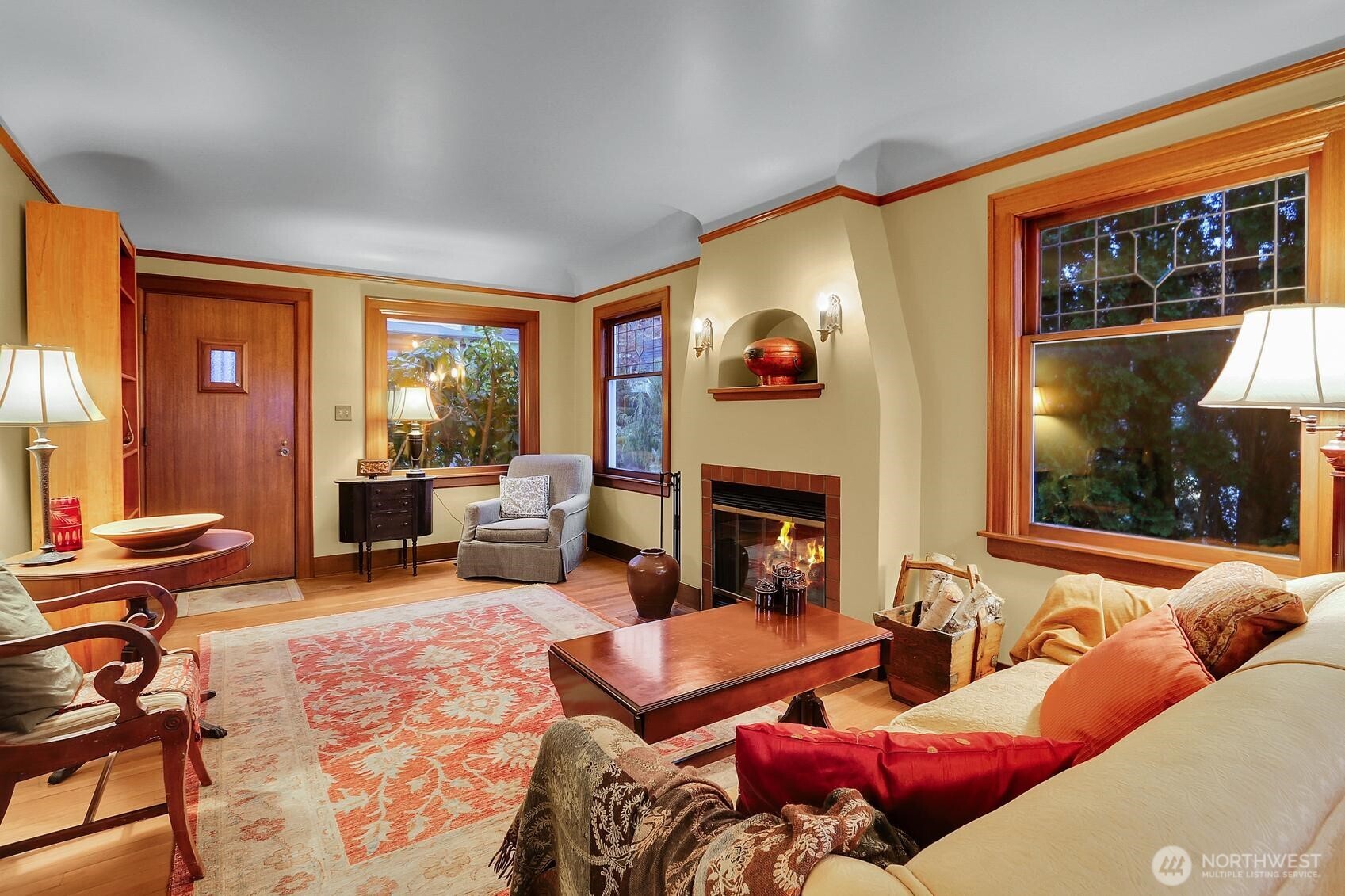 6535 Sycamore Avenue Northwest Seattle, WA 98117 - Photo 3 of 23 a living room with furniture and a fireplace
