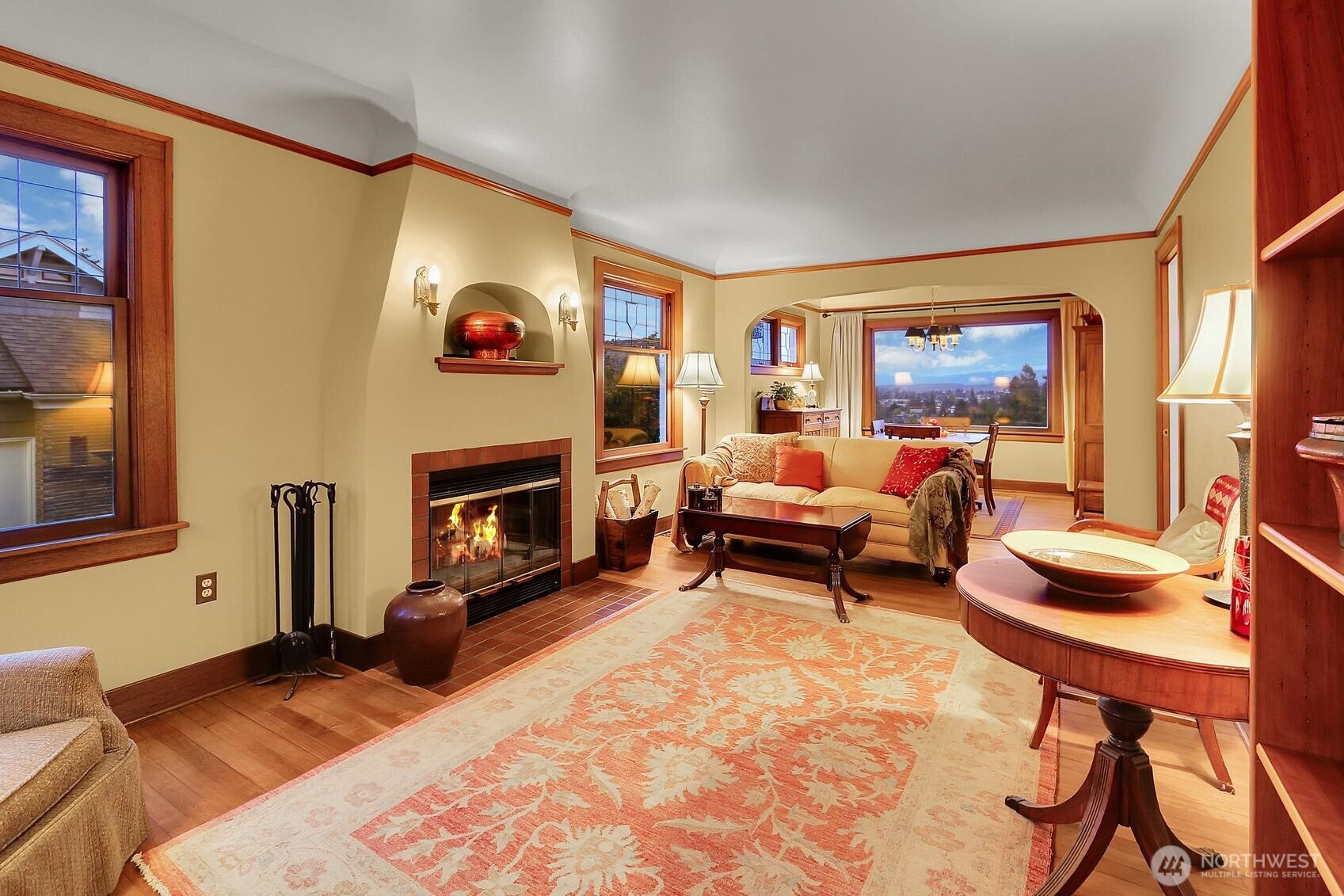 6535 Sycamore Avenue Northwest Seattle, WA 98117 - Photo 4 of 23 a bedroom with furniture and a fireplace