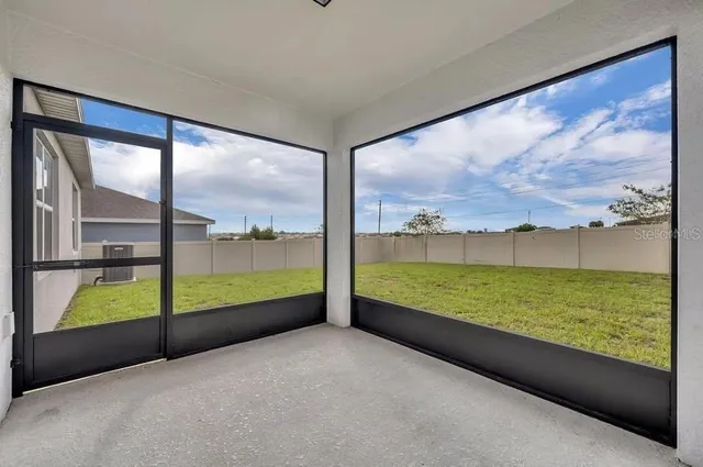 a view of a water fountain in front of a building