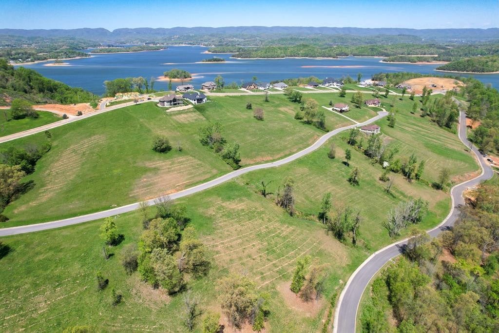 2069 Edgewater Sound Morristown, TN 37814 - Photo 6 of 17 a view of a lake with a mountain in the background
