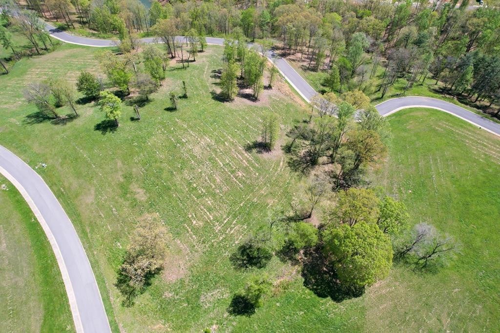 2069 Edgewater Sound Morristown, TN 37814 - Photo 7 of 17 a view of a garden with a lake