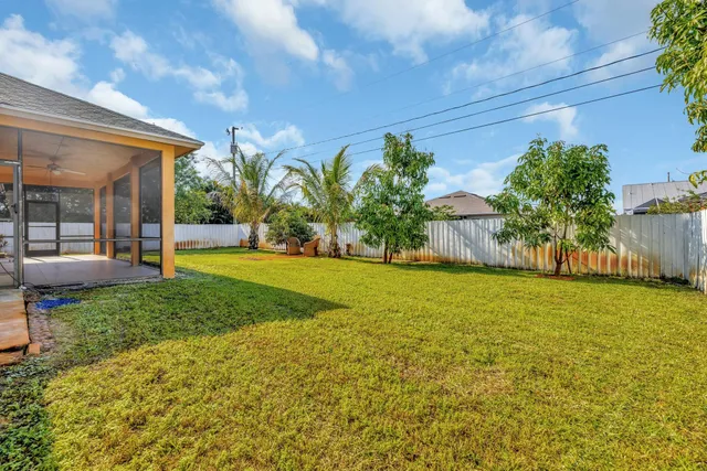 a view of a back yard of the house