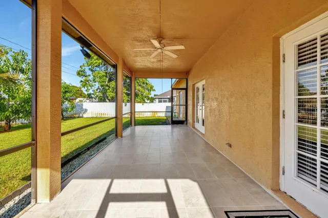 a view of a porch and garden