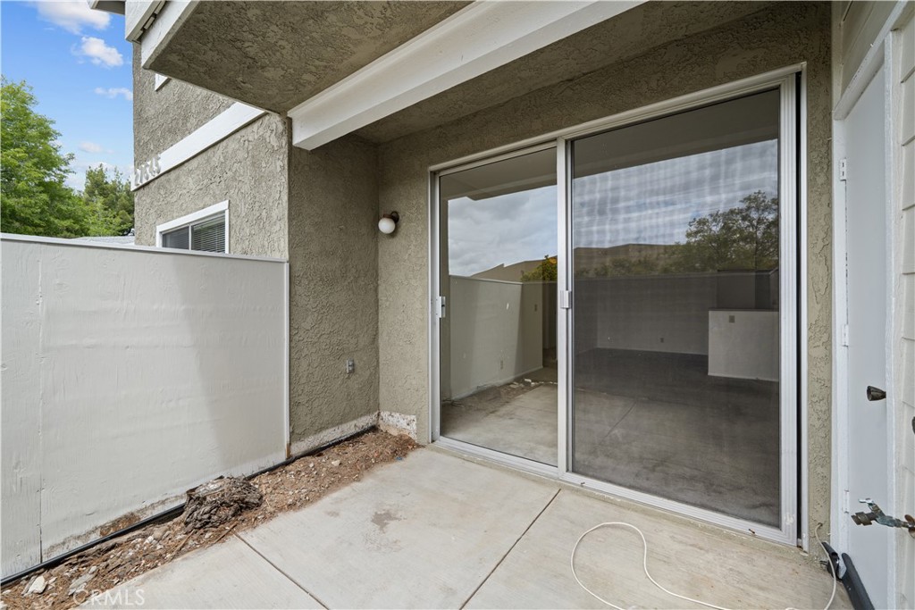 27645 Susan Beth Way, Unit A Saugus, CA 91350 - Photo 23 of 26 a backyard of a house