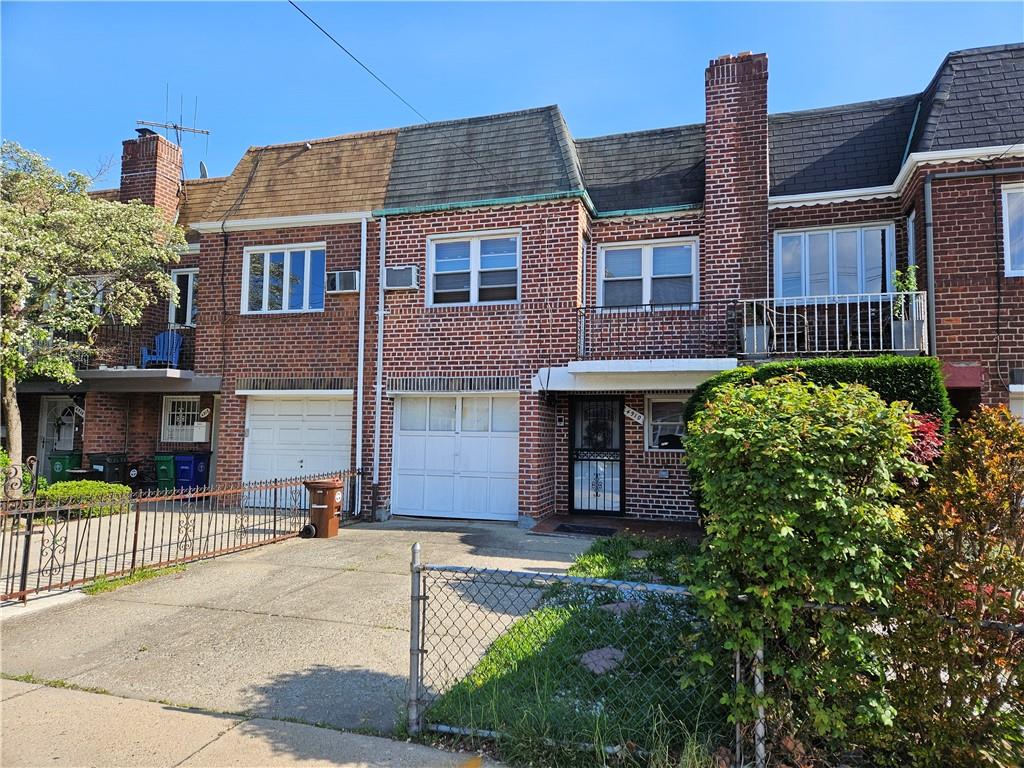 4910 Ave. M Brooklyn, NY 11234 - Photo 1 of 1 front view of a house with a garden