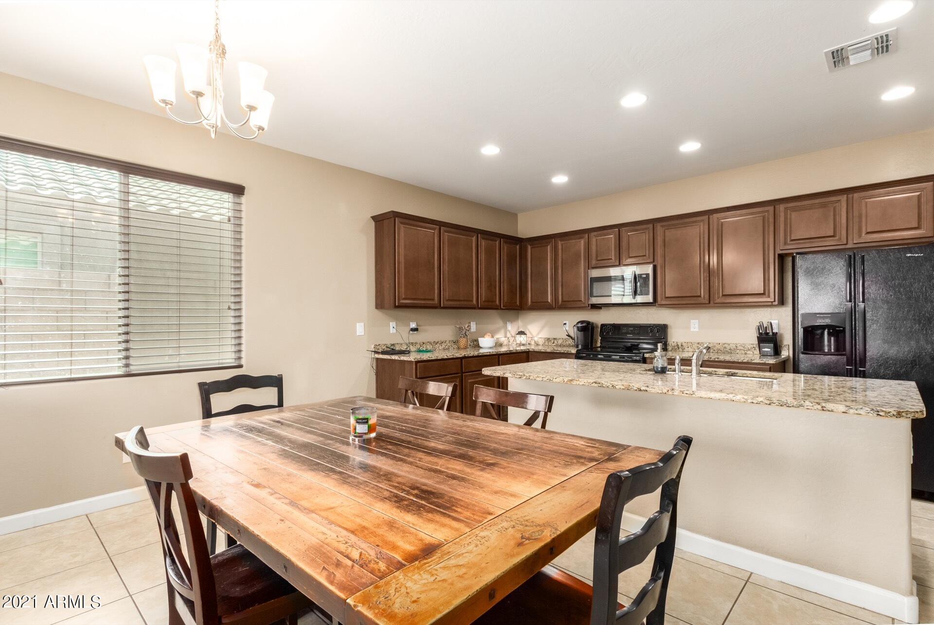 23849 West Ripple Road Buckeye, AZ 85326 - Photo 12 of 27 Kitchen/Dining