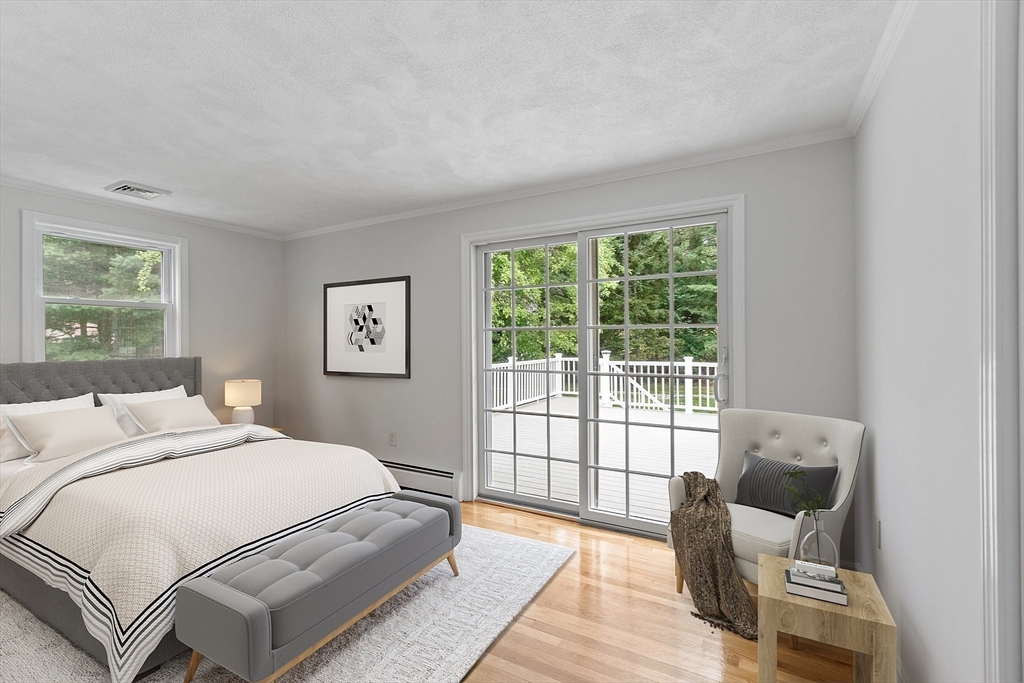 2 Johnson Road Chelmsford, MA 01824 - Photo 16 of 42 a bedroom with a bed and glass window