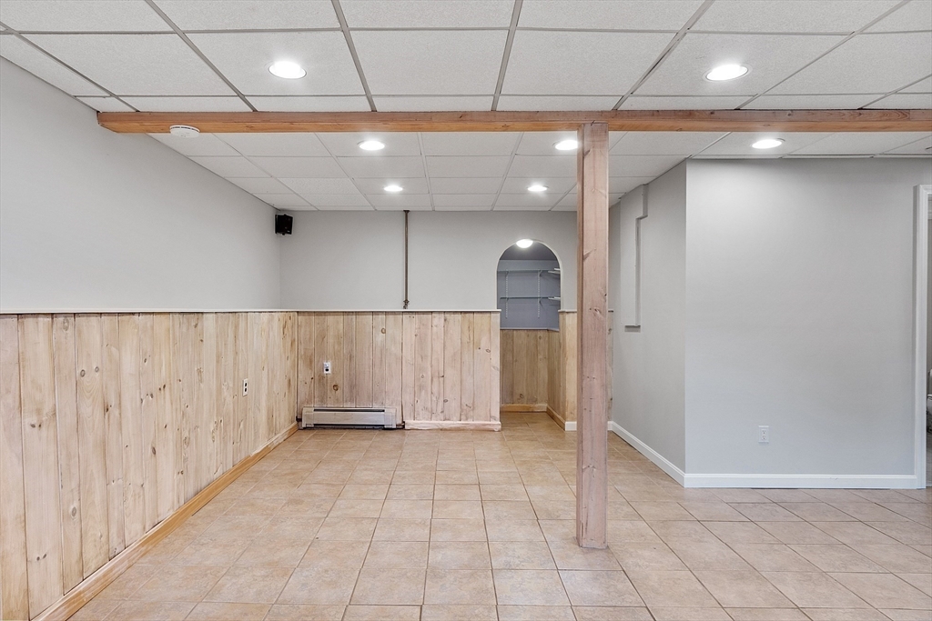 2 Johnson Road Chelmsford, MA 01824 - Photo 27 of 42 a view of a hallway with chandelier