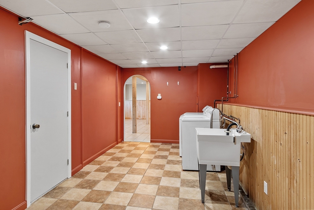 2 Johnson Road Chelmsford, MA 01824 - Photo 28 of 42 a bathroom with a sink a mirror and a toilet