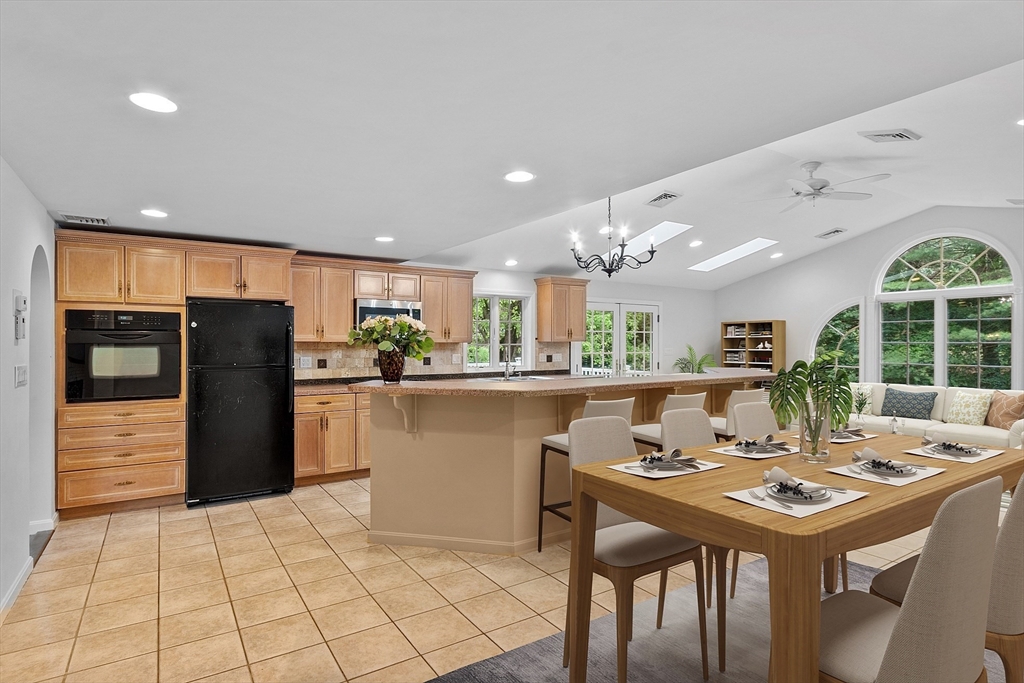 2 Johnson Road Chelmsford, MA 01824 - Photo 3 of 42 a kitchen with a table and chairs