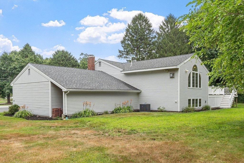 2 Johnson Road Chelmsford, MA 01824 - Photo 33 of 42 a view of a house with backyard