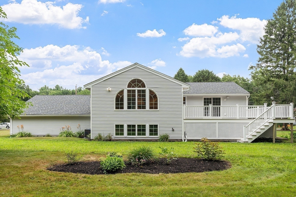 2 Johnson Road Chelmsford, MA 01824 - Photo 34 of 42 a view of a house with a yard