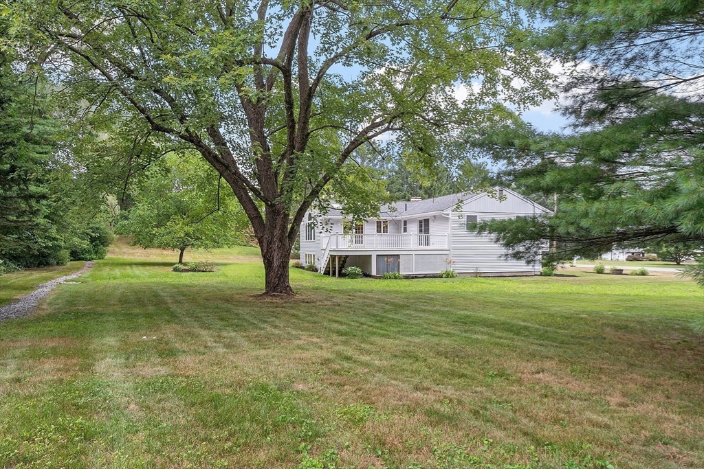 2 Johnson Road Chelmsford, MA 01824 - Photo 35 of 42 a view of a house with a yard